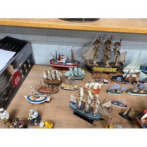 484 - Collection of model fishing boats & figures