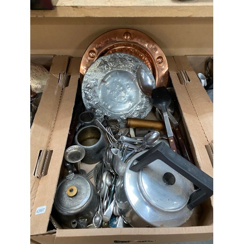 523 - 4 good mixed boxes of metal wares inc. pewter, brass gun powder flask, trivet, cutlery, platters, tw... 