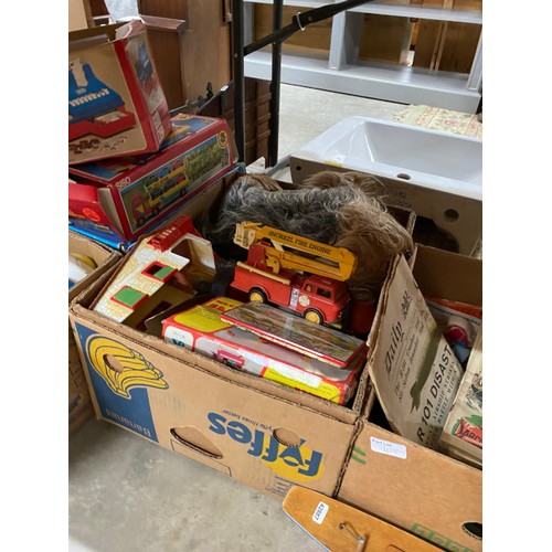 422 - Boxes of playworn toys including dolls, Fisher-Price, books, Casio SA-8 keyboard, soft toys, Lion co... 