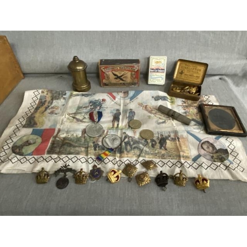 293 - Box of militaria inc. trench art money box, buttons etc.