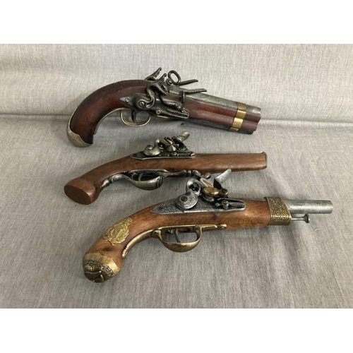 329 - 3 reproduction display flintlock pistols