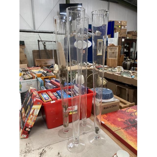 434 - 4 glass stem vases 1M high