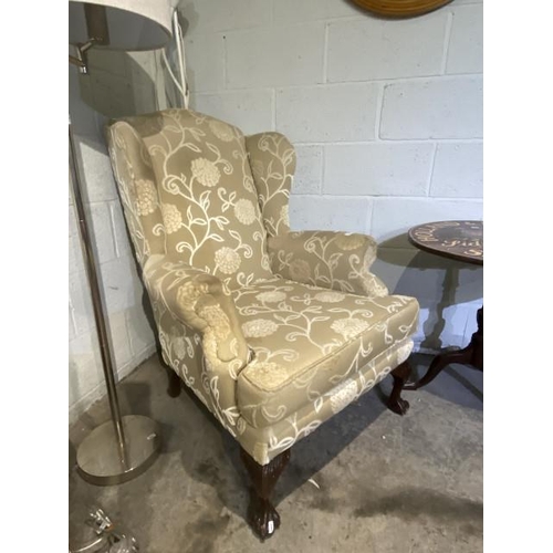 63 - Georgian style wing back armchair with ball and claw feet 85W