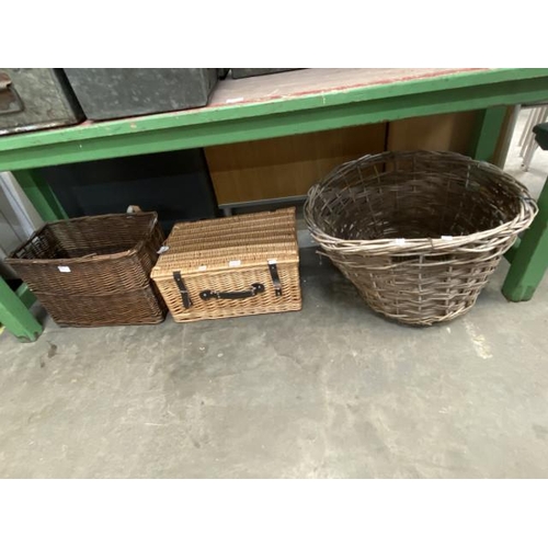 132 - 2 wicker log baskets 39H 70W & 35H 50W 30D and a wicker hamper 26H 51W 36D