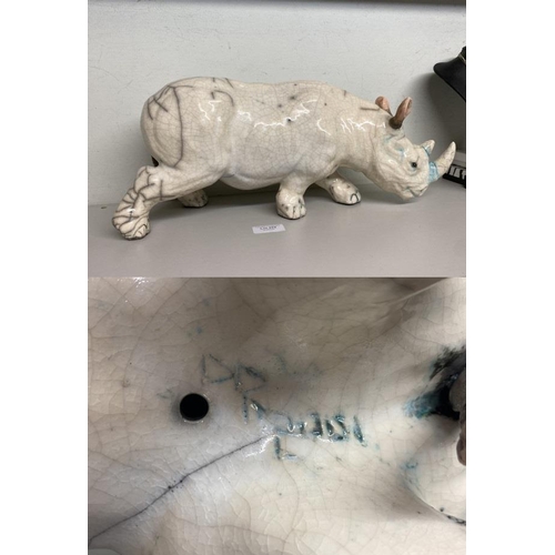 259 - Indistinctly signed crackle glaze Rhinoceros bought from the Christine Cumming Ceramics gallery (19c... 