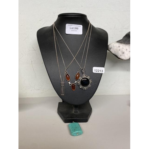 260 - 3 silver necklaces inc. jet, amber & additional turquoise pendant with 18ct chain loop