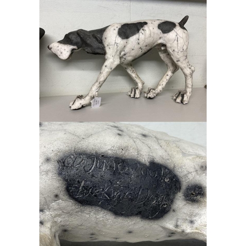 261 - Signed Christine Cummings Ceramics 'Lurking Dog' (One rear leg repaired, 24cm high 24cm long)