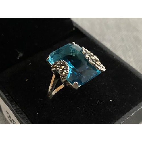 296 - Silver, blue stone & marcasite ring (size P 1/2)