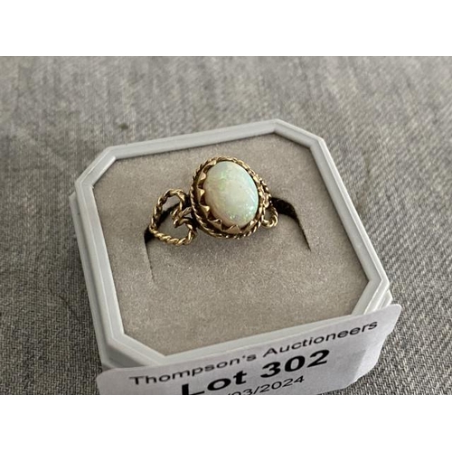 302 - 9ct gold and opal ring (size O, 2.1g)