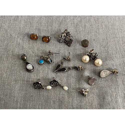 305 - 9 pairs of silver earrings inc. amber, jet, pearl, turquoise, moonstone etc.