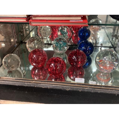 386 - 8 large glass paperweights