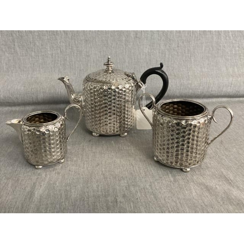 387 - Arts & Crafts honey comb 3 piece silver plated tea set