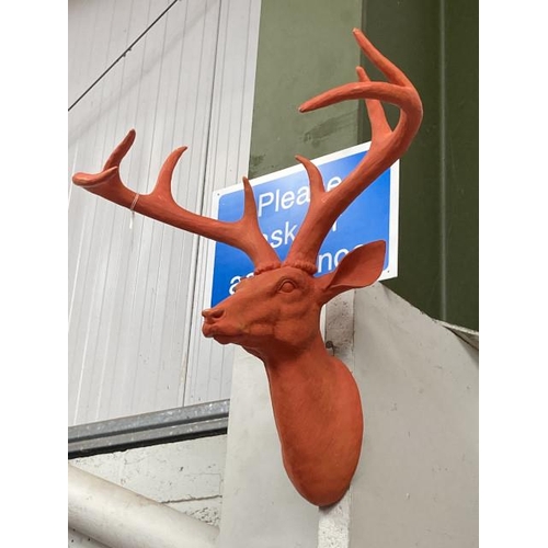 397 - Wall mounted orange Stags head