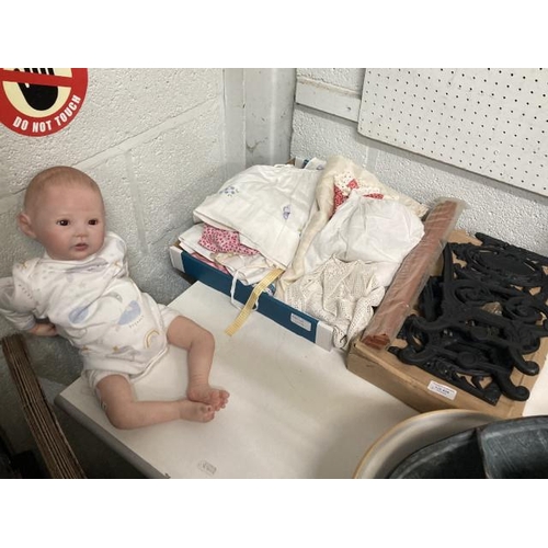 434 - Cast iron dolls bench (dismantled), Reborn doll & a collection of dolls clothing inc. vintage dresse... 