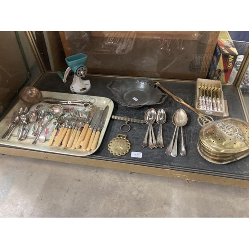 472 - Collection of mixed silver plated cutlery, brass chestnut roaster, 'Tudric' pewter clover bowl, Harp... 