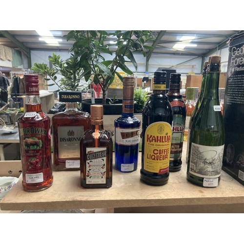 493 - 8 bottles of alcohol inc. Disaronno 700ml, Zubrowka 500ml, De Kuyper 50cl, Kahlua 700ml, Cointreau 0... 