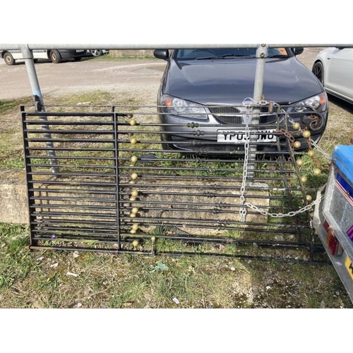 590 - Good quality wrought iron garden gates with posts (each gate 91W 200H)