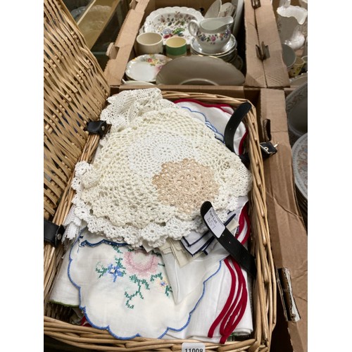 457 - Wicker basket of linens & lace, 5 glass vases & 45 piece fine china dinner & tea service