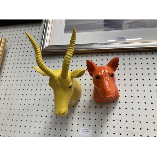 384 - Two resin wall mounted wild animal heads