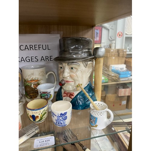 435 - 2 shelves of collectables including Goss, Toby jug, lighters etc