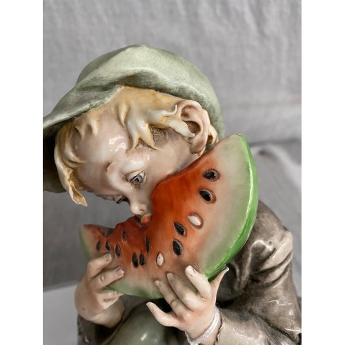 343 - Capodimonte porcelain Urchin Boy with watermelon figurine