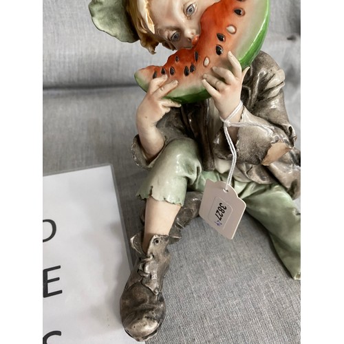 343 - Capodimonte porcelain Urchin Boy with watermelon figurine