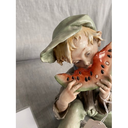 343 - Capodimonte porcelain Urchin Boy with watermelon figurine