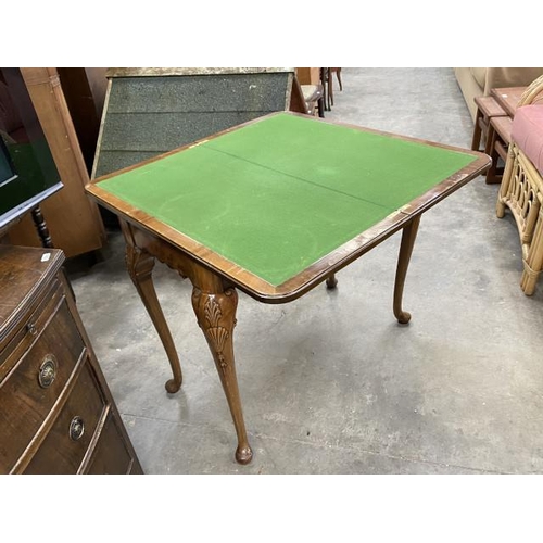 111 - Victorian walnut fold over games table 74H 84W 42D (top will require re polishing)