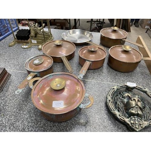 216 - 7 piece copper & brass cookware set (One lid handle as found)