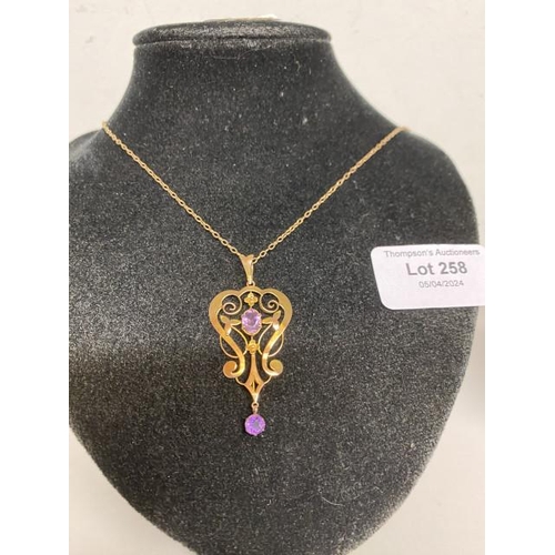 258 - 9ct gold Art Nouveau amethyst set pendant on a 9ct gold chain (chain length 42cm , 3g)