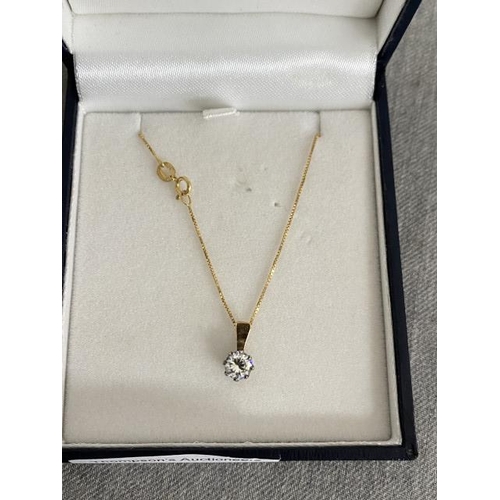 299 - 9ct gold solitaire pendant on a 9ct gold chain (chain length 38cm, 1.5g)