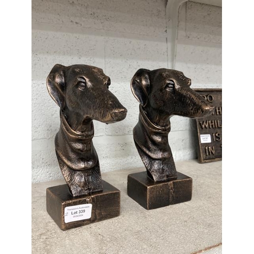 339 - 2 cast greyhound heads