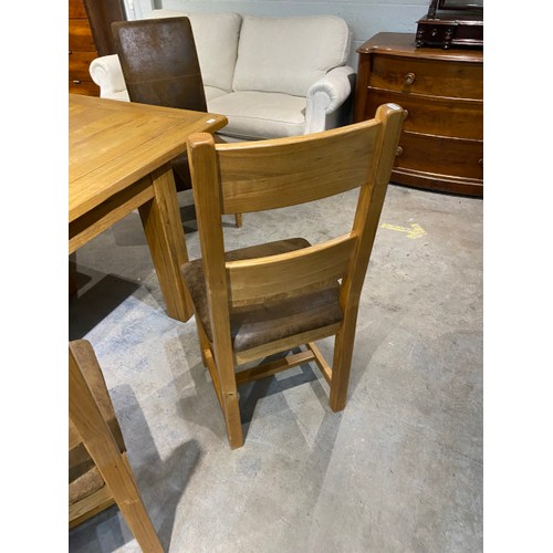 92 - Barker & Stonehouse extending oak dining table 79H 250W 100D with 6 matching chairs and 2 brown sued... 