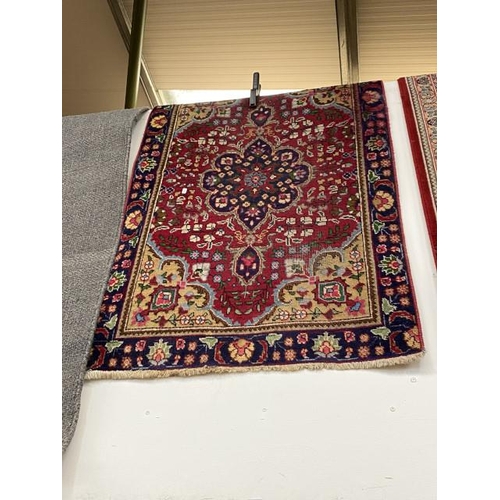 125 - Persian red ground rug 145 x 90cm