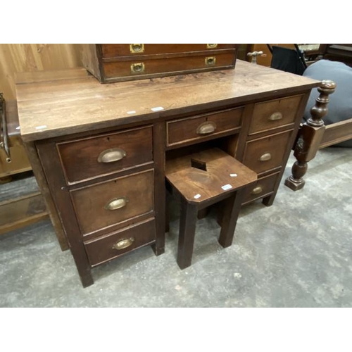 214 - 1930's oak desk 77H 123W 73D and an oak stool 47H 34W 42D