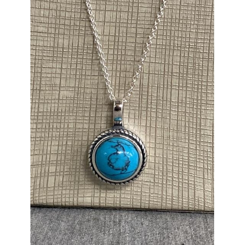 271 - Silver & turquoise pendant on silver chain (chain 44cm long)