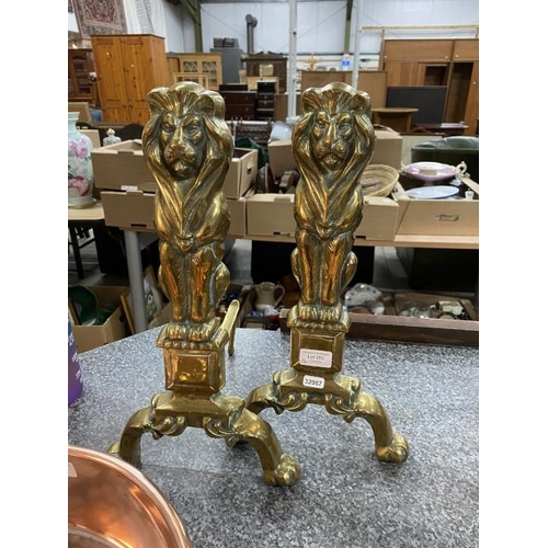 293 - Pair of brass lion fire dogs 44cm tall