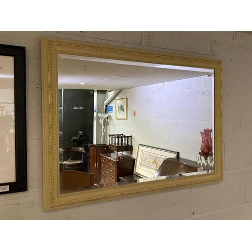 84 - Cream and gilt framed bevel edged mirror 103 x 73cm