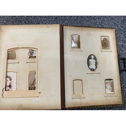 267 - Two Victorian photograph albums (One missing clasp) as found