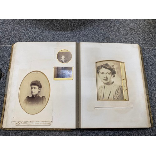 267 - Two Victorian photograph albums (One missing clasp) as found