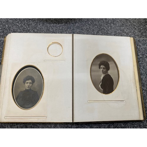 267 - Two Victorian photograph albums (One missing clasp) as found