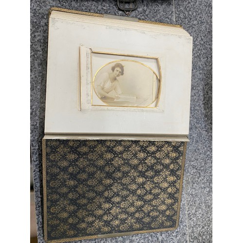 267 - Two Victorian photograph albums (One missing clasp) as found