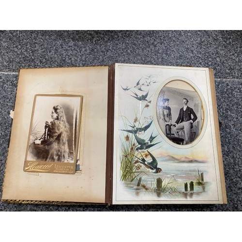 267 - Two Victorian photograph albums (One missing clasp) as found