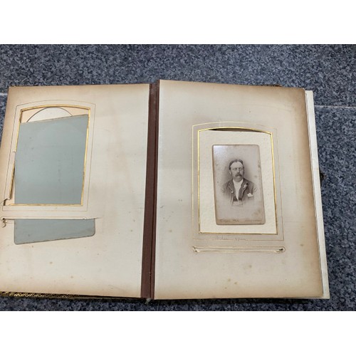 267 - Two Victorian photograph albums (One missing clasp) as found