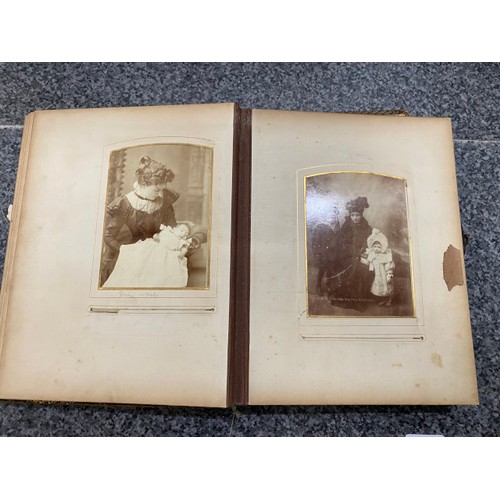 267 - Two Victorian photograph albums (One missing clasp) as found