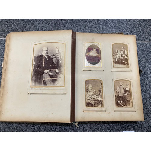 267 - Two Victorian photograph albums (One missing clasp) as found