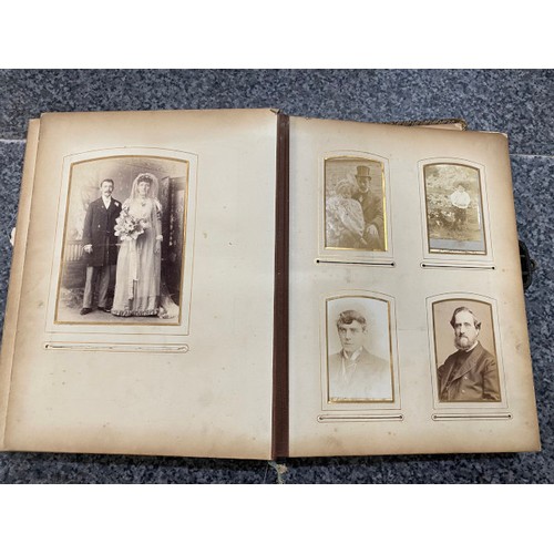 267 - Two Victorian photograph albums (One missing clasp) as found