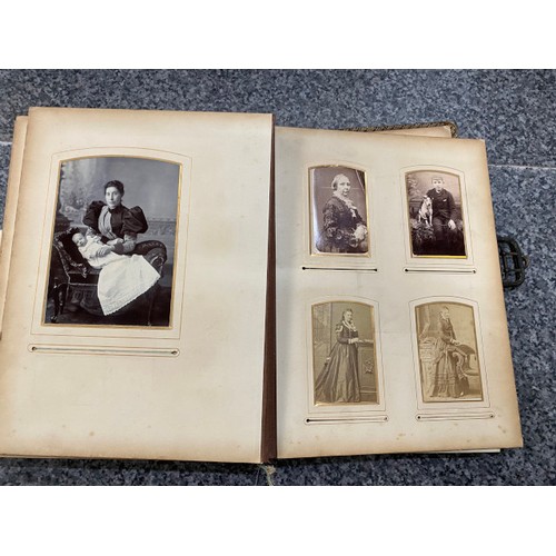 267 - Two Victorian photograph albums (One missing clasp) as found