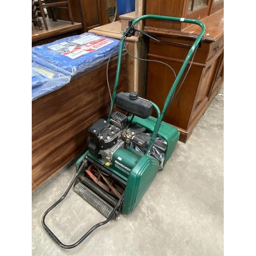 165 - Qualcast Classic Petrol 35s lawnmower, with mechanical scarifier, instruction booklet & grass collec... 