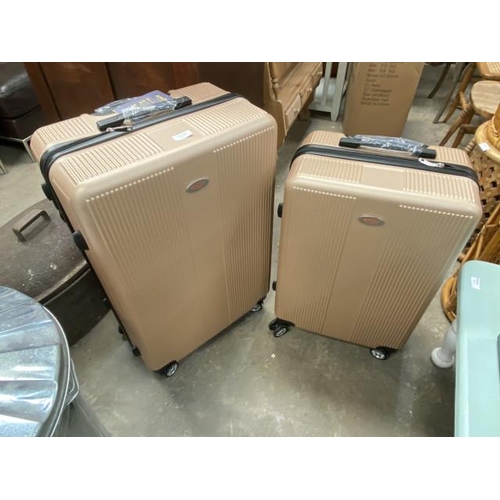 186 - 2 graduated AHOY suitcases in champagne (24” & 28”) NEW